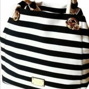 Michael kors handbags used but a few times only.